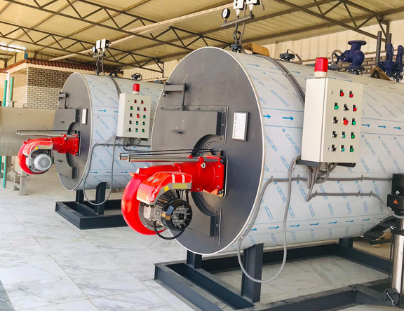 Large horizontal industrial steam boiler with red and black burner
